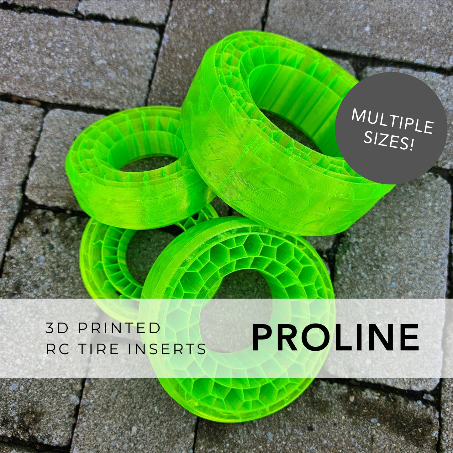 Proline tire foam inserts that are 3d printed laying in a pile. These are for RC crawlers and shows a variety of tire foam sizes.